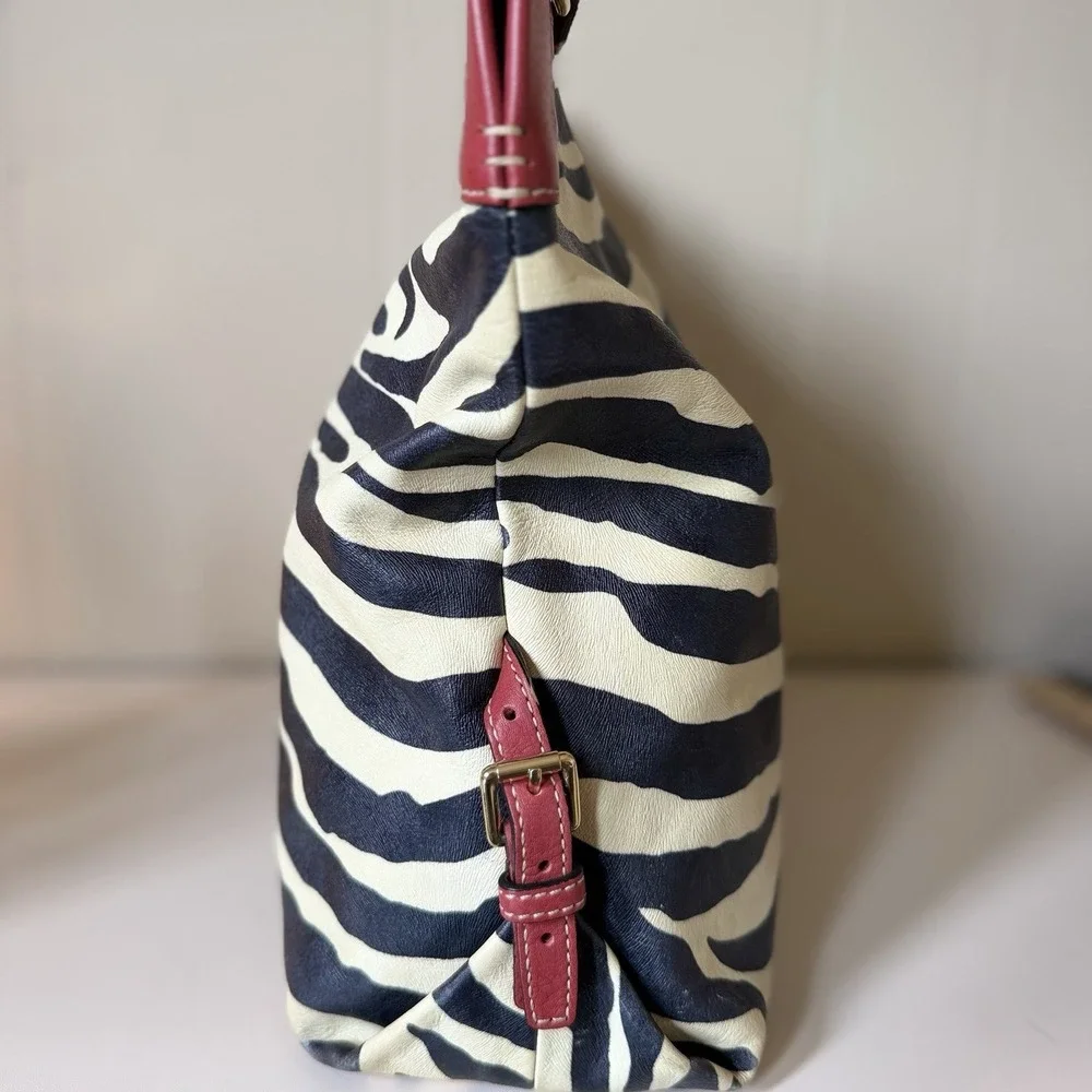 Dooney & Bourke Black and Cream Zebra Print Hobo with Red Trim